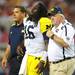 Michigan senior quarterback Denard Robinson walks off the field after an injury during the second half of the Cowboy Classic at Cowboy Stadium in Arlington, Texas on Saturday. Michigan lost to Alabama, 41-14. Melanie Maxwell I AnnArbor.com
